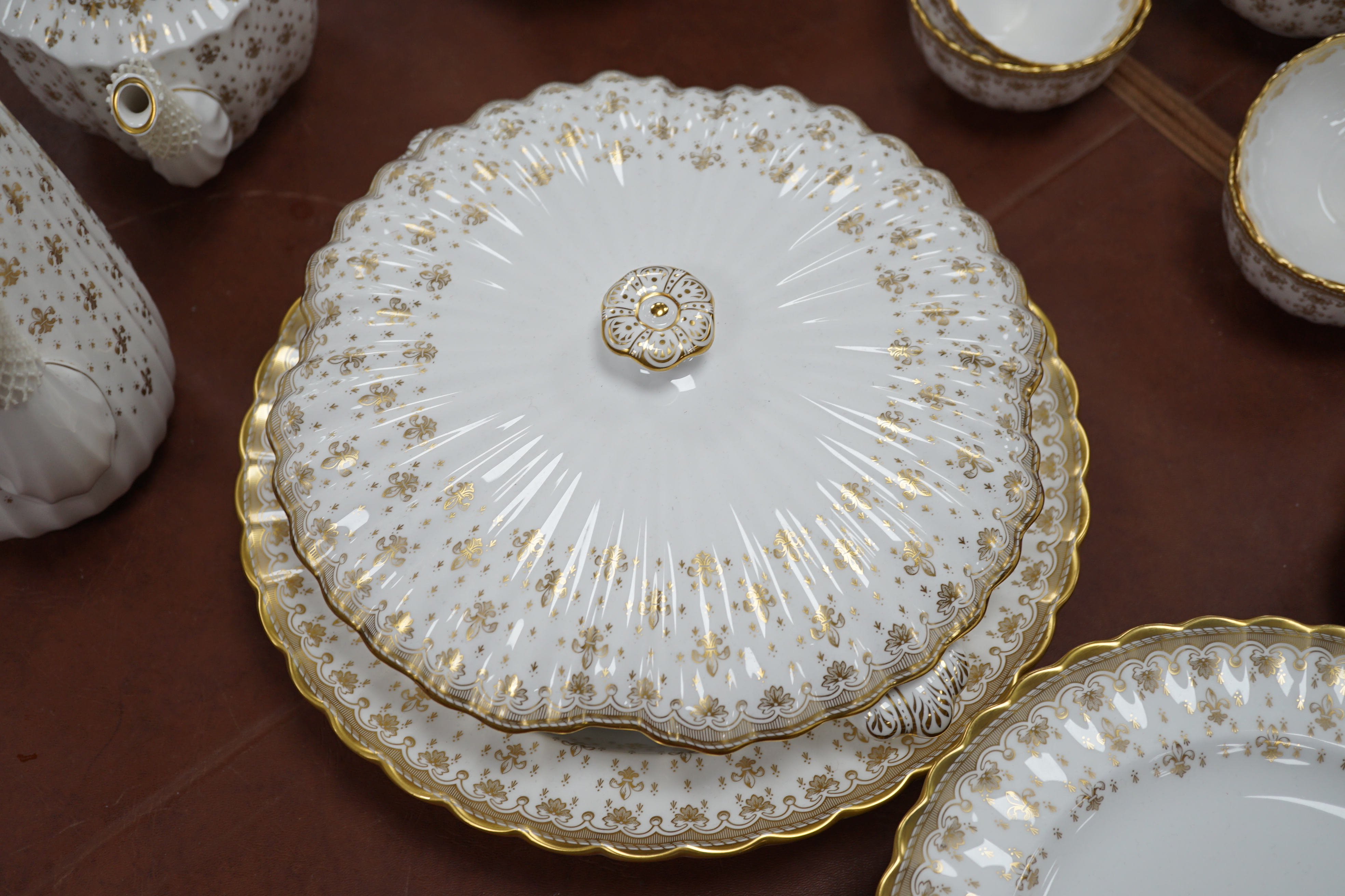 A Spode ‘Fleur de Lys’ dinner, tea and coffee set, settings for eight